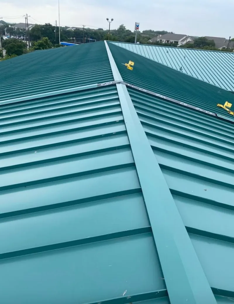 Green commercial metal roof ridge and valley for Metal Roof Repair in Northumberland